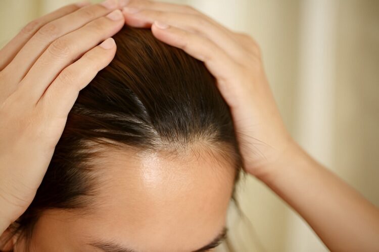 A woman has problems with hair and scalp