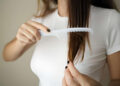 Woman brushing her hair