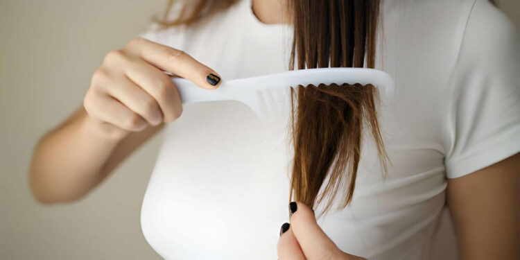 Woman brushing her hair
