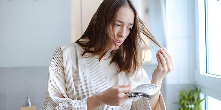 Young woman with hair problems